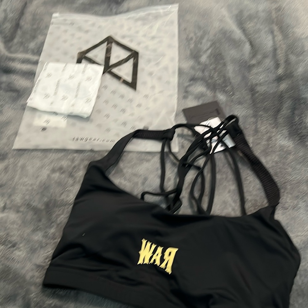 Brand new RAW workout top with tags and original packaging.